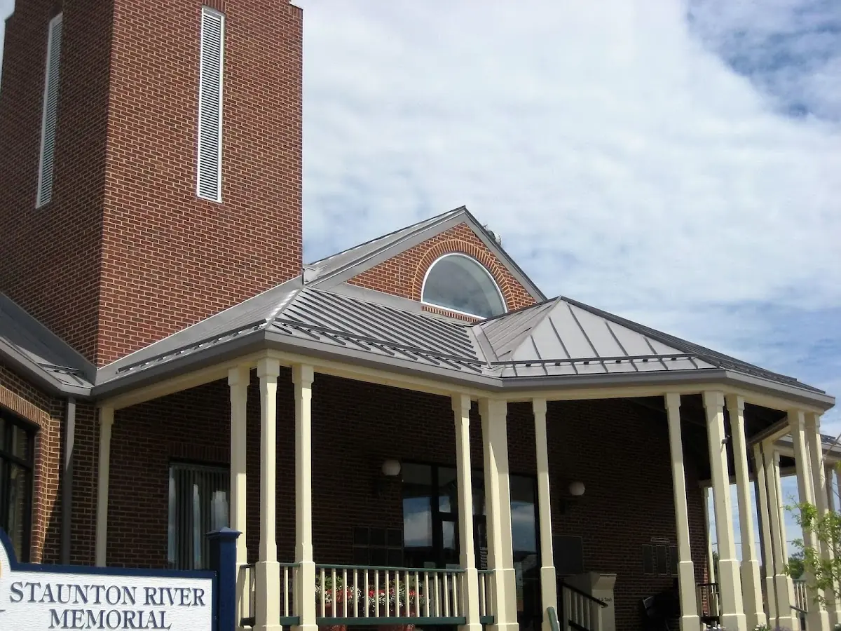 Skilled roofing craftsmen working on a residential roof in Tuckahoe